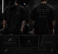 Strength Is Earned Tee - lifestyle front and back